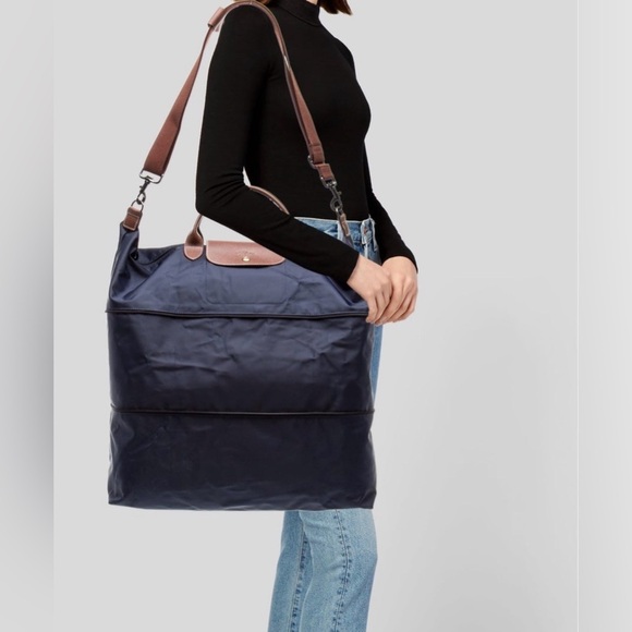 Longchamp Handbags - Longchamp Orange and Brown Travel Bag with Expandable Design Strap Imcluded